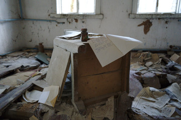 Fototapeta na wymiar Chernobyl/Pripyat - Abandoned books and paperwork