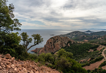 cap roux hiking trail In the red rocks of the Esterel mountains with the blue sea of the Mediterranean