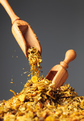 Wooden spoons with mixture of different  spices