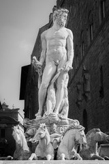 Black and white detail of the Fountain of Neptune, sculpted by Bartolomeo Ammannati in around 1560, and preserved in Florence, Italy