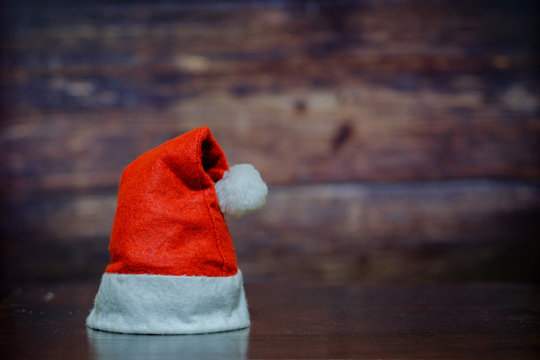Christmas hat on the wood.