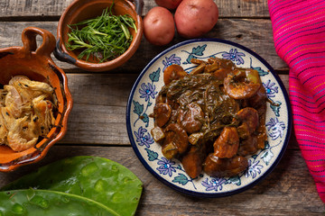 Mexican rosemary with mole sauce and dried shrimps also called 