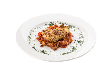 Pork Loin steak with honey mustard sauce and zucchini and eggplant stew isolated on white background