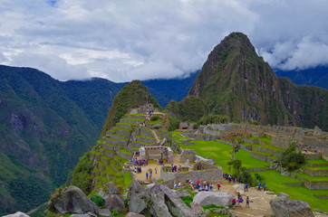 Machu Picchu, legendary Inka capital Peruvian Andes. Historic and ancient ruins and stonewalls high in the mountains. UNESCO world cultural heritage, new wonder of the world and tourist destination