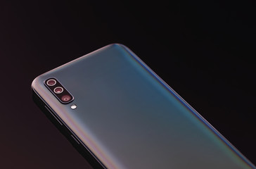 Smartphone with three lens camera.