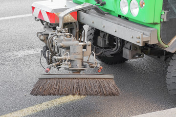 Street cleaning machine. Street sweeper machine working