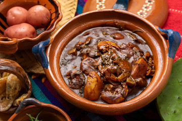 Mexican rosemary with mole sauce and dried shrimps also called 