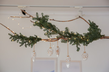 Christmas tree decorated with New Year's toys with mice and balls.Dear New Year.