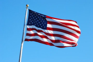 American flag against a blue sky at Fort Wadsworth in Staten Island, NY