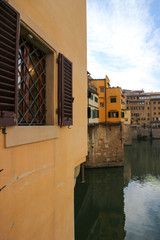 View to river Arno and ponte vecchio florence italy in sunny winter day