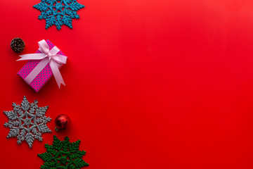  Flat lay of Christmas composition for background on red background. Christmas, winter, new year concept. copy space and soft focus.