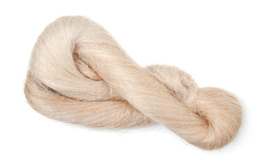 Raw flax fiber isolated on white.