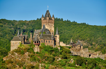 Fototapeta na wymiar Beautiful Reichsburg castle on a hill in Cochem town, Germany