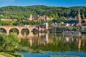 Fototapeta na wymiar Heidelberg town with old Karl Theodor bridge and castle on Neckar river in Baden-Wurttemberg, Germany