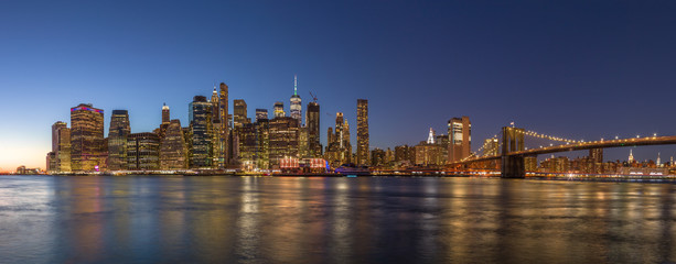 Naklejka na ściany i meble New York City downtown evening skyline buildings