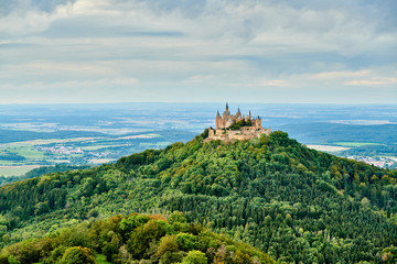 Fototapeta na wymiar Hilltop Hohenzollern Castle on mountain top in Swabian Alps, Baden-Wurttemberg, Germany