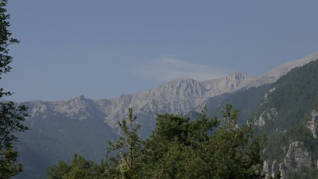 Top of the Olympus mountain from sea level 4K tiltin video