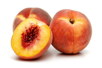 Fototapeta na wymiar Ripe peach fruit with slice isolated on white background