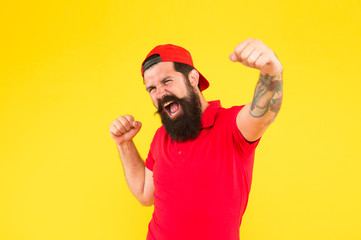happy emotional guy. male summer fashion. Barber salon and facial hair care. being trendy and brutal. Beard and mustache grooming. happy mature hipster yellow backdrop. bearded man celebrate success