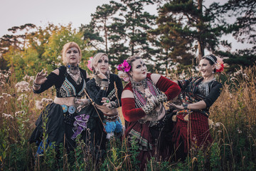 Tribal dancers in the forest