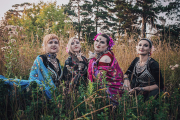 Tribal dancers in the forest