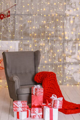 Christmas decorations in red and white. Hearts, boxes and garlands.