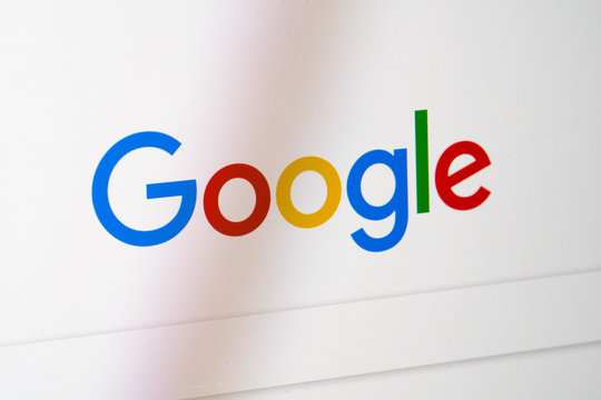 Google icon with find row on laptop