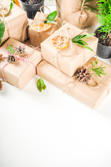 Collection of christmas gift boxes with natural rustic decorations. Organic vegan, no plastic concept, Zero waste life style.