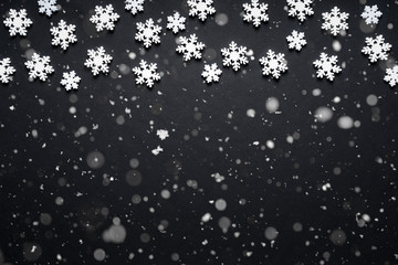 Snow flake texture and falling snow on black background