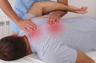 Chiropractic treatment. Shiatsu massage, Back Pain trigger points. Physiotherapy for male patient, Sport Injury Recovery