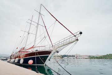 Fototapeta na wymiar Big beautiful yacht at sea harbour.