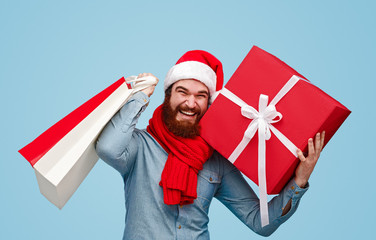 Optimistic guy during Christmas shopping