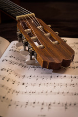 Guitar on sheet music notes