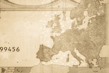 Map of Europe on a banknote of 100 euros close-up. Old retro vintage style photo.