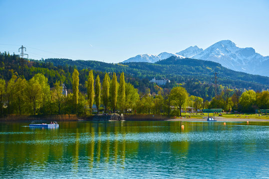 Beautiful Mountains and a lake in autumn.  Baggersee (Badesee Rossau), Innsbruck, Austria