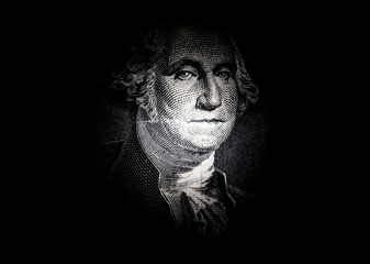 Portrait of George Washington on a US 1 dollar banknote macro close-up in a black background