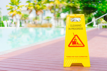 Sign showing warning of Cleaning in progress floor in swimming pool.Cleaning in Progress sign.