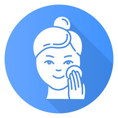 Applying moisturizer blue flat design long shadow glyph icon. Skincare procedure. Facial beauty treatment. Cleansing effect for healthy skin. Makeup removal. Vector silhouette illustration