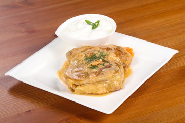 Homemade stuffed cabbage with cream