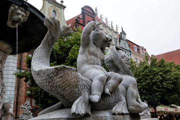 Gdansk, Poland - 06/07/2019: Sculptures at the Neptune Fountain.