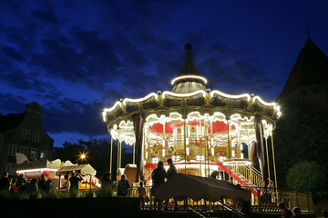 Fototapeta premium Poland, Gdansk 08.16.2019: Children's carousel in the waterfront area.