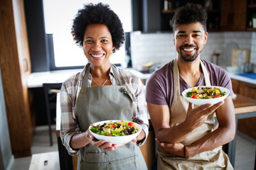 Portrait of happy chefs in kitchen. Healthy food, cooking, people, kitchen concept