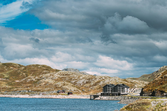 Oppland, Tyin Lake, Norway. Stones On Coast Of Beautiful Lake Tyin In Summer Cloudy Day. Norwegian Nature