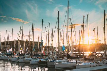 Stockholm, Sweden. Jetty With Many Moored Yachts During Summer Sailing Regatta In Sunset Lights