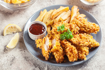 Chicken strips in cornflakes breadcrumb