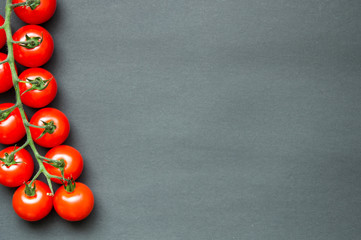 cherry tomatoes on a wooden board
