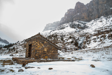 Ordesa National Valley in snowy autumn, located in Pyrenees Spain