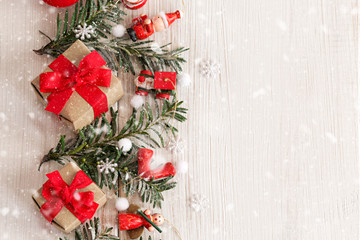 Fototapeta na wymiar Christmas border frame with fir tree, gifts and Christmas red toys