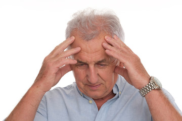 Older man is having a headache. Patient isolated on white background.