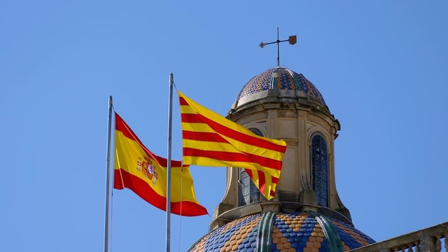 Spain and Catalan glags waving in the wind,Barcelona,Spain 